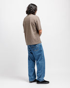 Cabin Smoke | On Model Full Back Person wearing a brown shirt and blue jeans on a white background