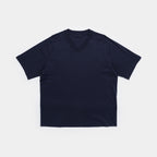 Deepwater Navy | Front A dark navy blue short-sleeve V-neck t-shirt laid flat against a light gray background.