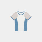 Cougar Milk / Frostbite Blue / Silver Tip | Front A short-sleeve ringer t-shirt with a colorblock design, featuring a white center panel, light blue side panels and collar trim, and beige shoulder yokes, shown flat on a light gray background.