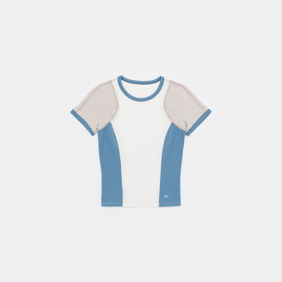 A short-sleeve ringer t-shirt with a colorblock design, featuring a white center panel, light blue side panels and collar trim, and beige shoulder yokes, shown flat on a light gray background.