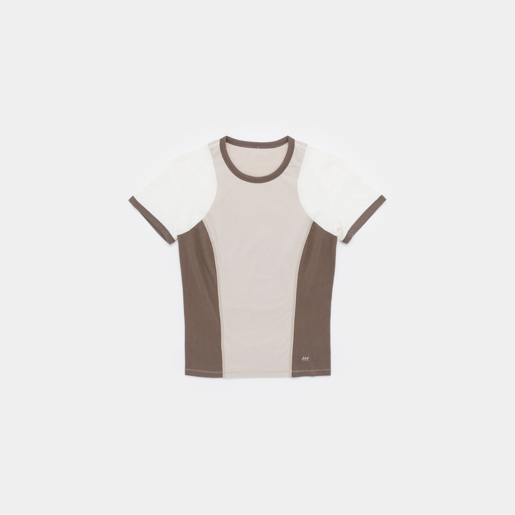 A short-sleeve athletic t-shirt with a colorblock design in beige, white, and brown, displayed flat against a light gray background.