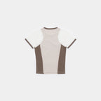 Silver Tip / Cabin Smoke / Cougar Milk | Back A short-sleeve colorblock t-shirt shown from the back, featuring a light beige center panel, white shoulder panels, and dark brown side panels and collar trim, laid flat against a light gray background.