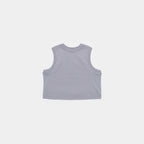 Chiseled Stone | Front A sleeveless crop top in a light grayish-purple color, shown from the back on a solid light gray background.