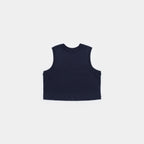 Deepwater Navy | Front A sleeveless cropped tank top in solid navy blue, shown from the back against a light gray background.