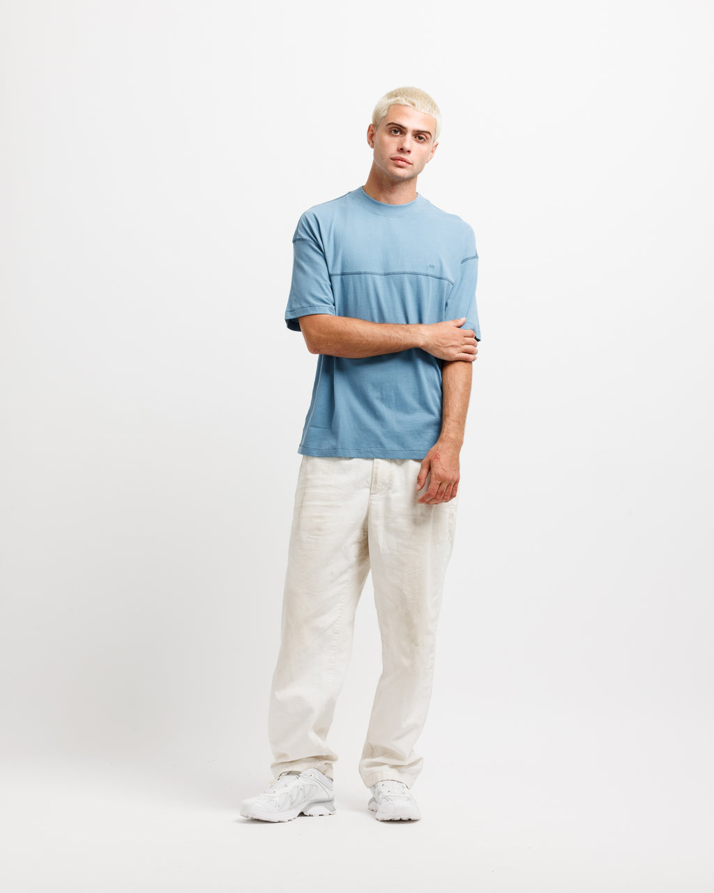 Man wearing a nice blue tee.