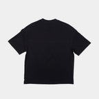 Ink Black | Back Black t-shirt on a light gray background
